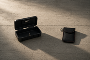 The Box: closed, with the coiled steel security cable beside it